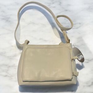 Carlos D’Santi ivory purse NWT